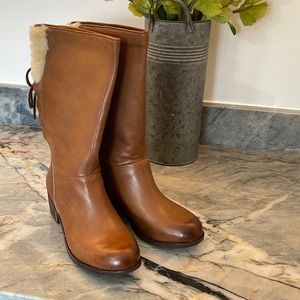 UGG mid calf boot.  Tie up fur back.  Brown leather.  Brand new